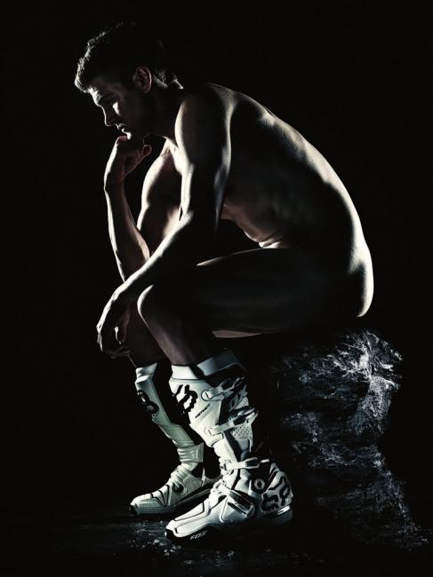 Poor Ryan. According to this image, he’s either sad because he can’t afford the rest of his riding gear, or he just pooped on a really big rock.