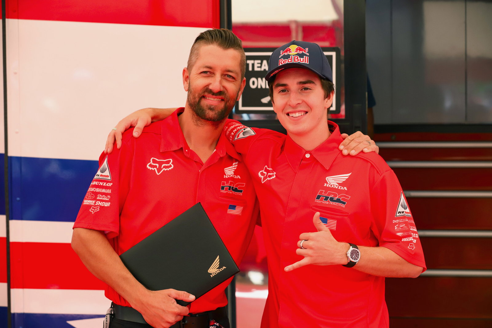 Honda HRC team manager Lars Lindstrom with Hunter Lawrence.
