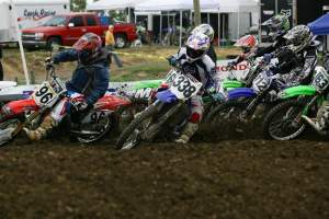 Zach (338) gets the holeshot over Tyler Wharton (96) and the rest of the MX A class