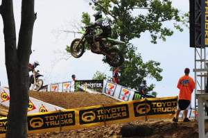Jake Moss was a contender in moto 1 before his Factory Kawasaki started smoking and he wheelied over backwards.