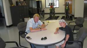 Adam and EJ at the Pro Circuit shop.