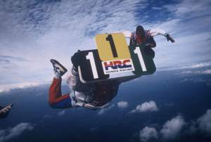 What do you do if you’ve just won all three world titles and you’re on top of the world? You skydive with your plates! That’s what Eric Geboers did.