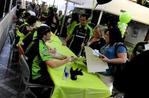 After the announcement and interviews, all of the new Kawasaki racers signed autographs for the employees and their families.