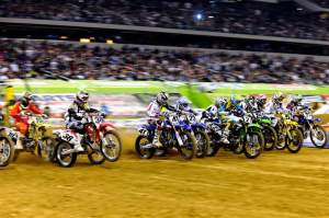 The 450cc class leaves the line and heads to turn one inside Cowboys Stadium in Arlington.