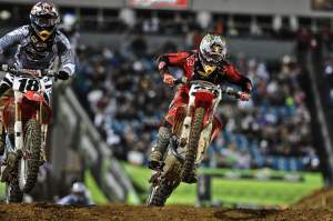 Trey Canard (38) passed his way through the field. Here, he passes temporary teammate Davi Millsaps (18) for fifth.