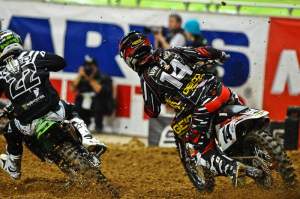 Kevin Windham (14) works his way around the outside of Chad Reed (22) in the main event. Windham ended up second.
