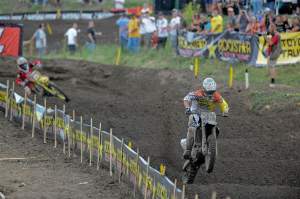 Josh Grant (33) came from behind to win the first moto over Dungey (5).