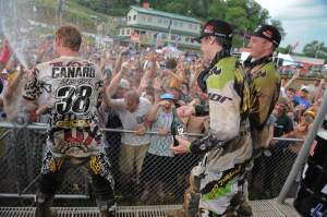 Trey Canard (38), Dean Wilson (middle) and Tyla Rattray (right) celebrate on the podium.