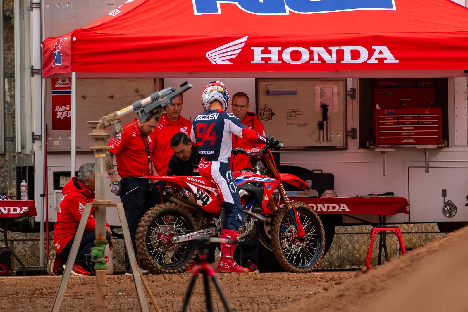 Troxell and the Honda crew looking at Roczen's bike during the 2020 Honda team press day.