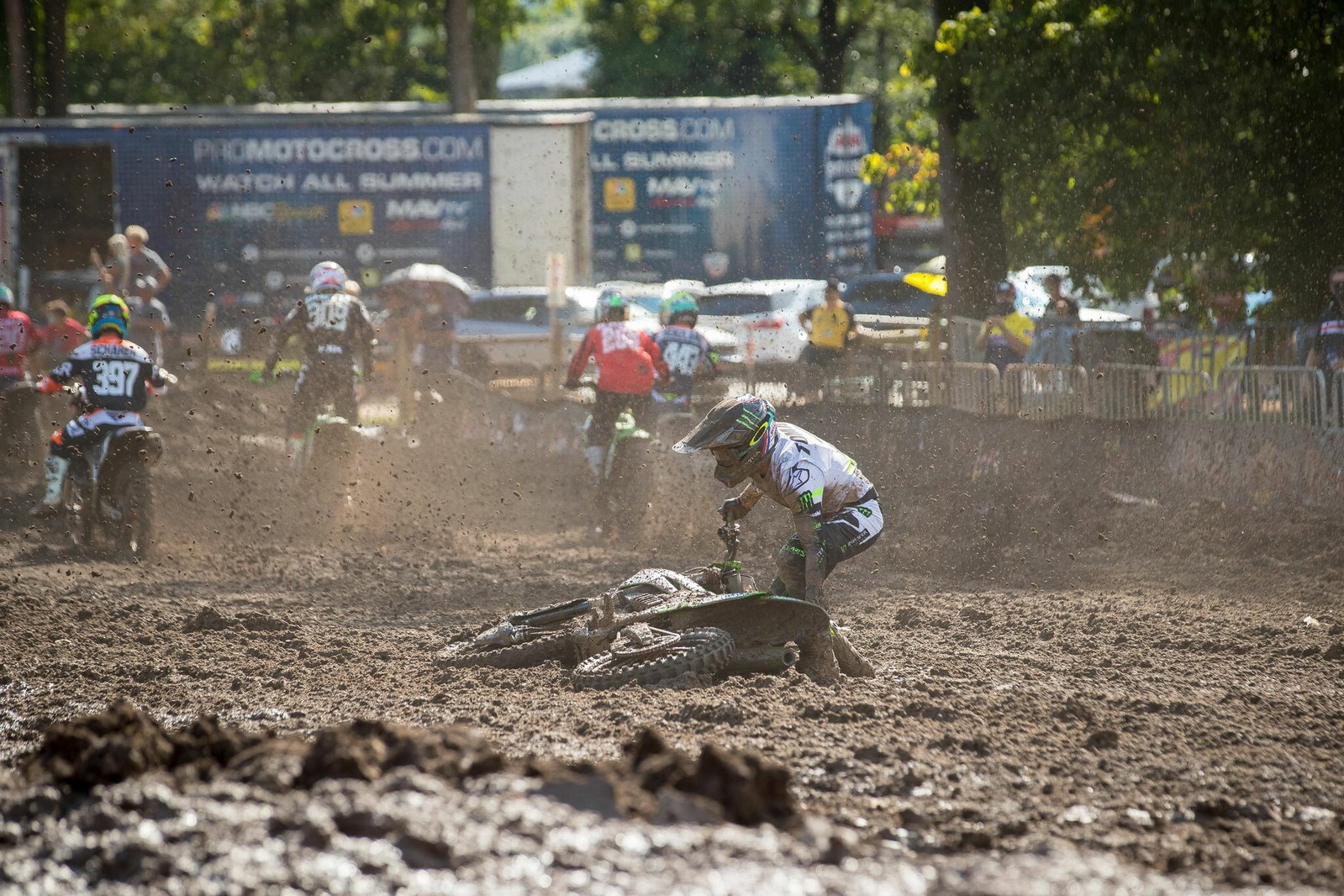 Eli Tomac down in the first turn.