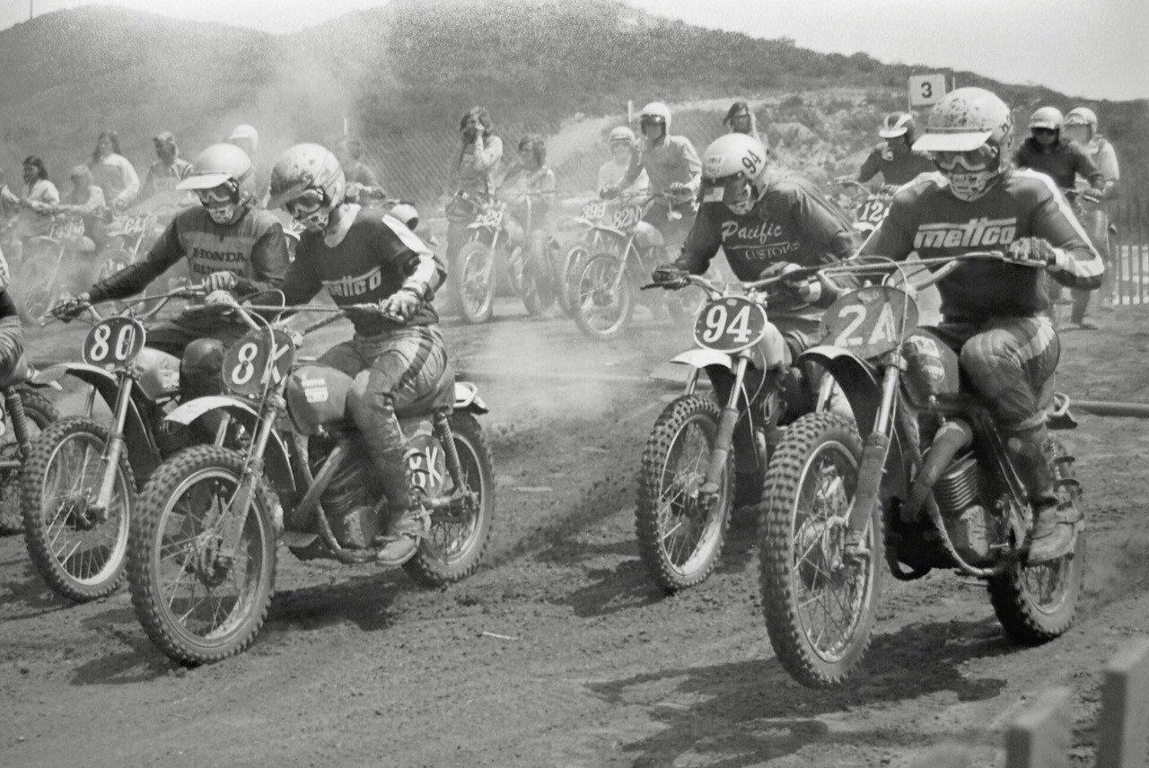 I&rsquo;ve since learned more about this photo: Bob Seki is #12 and #94 is Wes Sutton. And the kid way off to the left on the #F49 is Warren Reid.