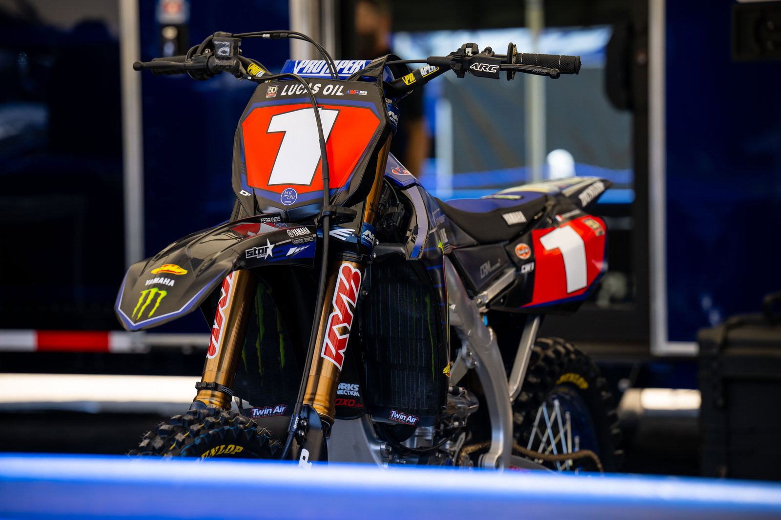 Dylan Ferrandis' Yamaha YZ450F sitting still under the Monster Energy Yamaha Star Racing tent at the opener.
