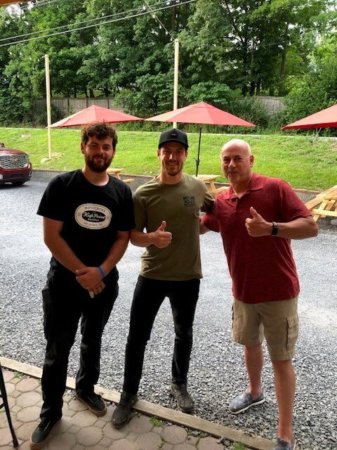 Phil with Jim Queen and his son.