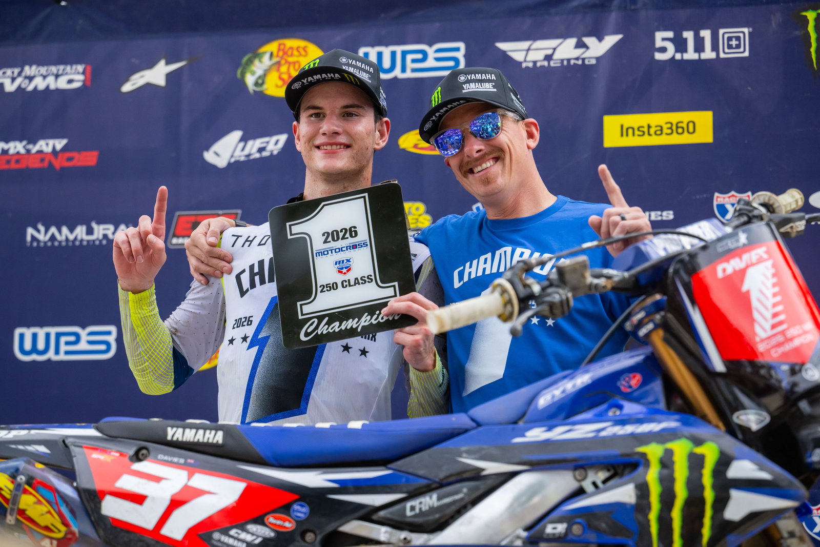 Cole Davies with his 2026 250 Class AMA Pro Motocross Championship #1 plate.