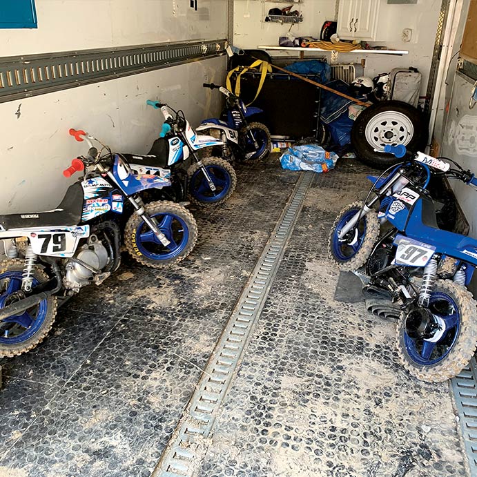 a few protested pee-wee bikes sit in the impound trailer