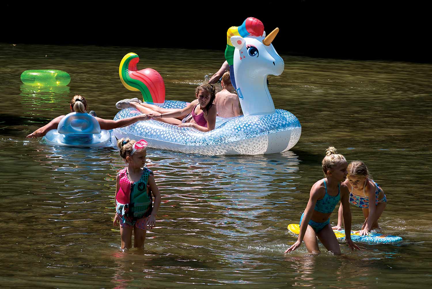 A unicorn floats down Hurricane Creek
