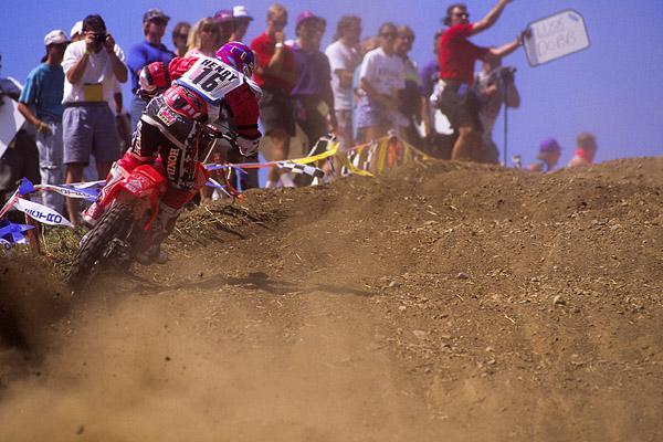 Doug Henry blasts up past the old mechanics' area at Unadilla.